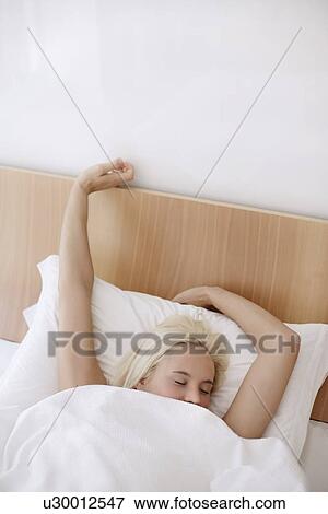 Woman waking View Large Photo Image Stock Photo - Woman waking. Fotosearch