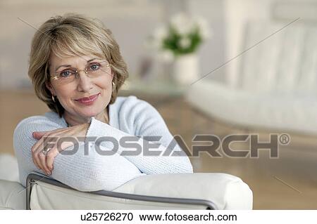 Stock Image - Woman wearing glasses. Fotosearch