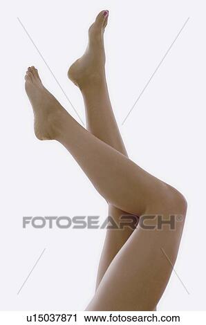Stock Image - Woman's legs. Fotosearch