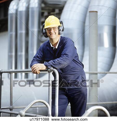 Stock Photo - Worker in a power station. Fotosearch