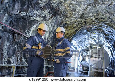 Workers in tunnel in hydroelectric power station View Large Photo Image Stock Image - Workers in tunnel in hydroelectric power station. Fotosearch