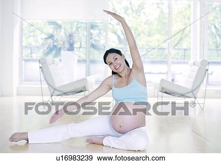 Yoga in pregnancy View Large Photo Image Stock Photo - Yoga in pregnancy. Fotosearch