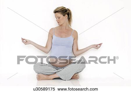 Stock Photography - Yoga in pregnancy. Fotosearch