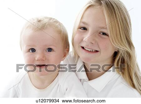 Young girl and baby View Large Photo Image Picture - Young girl and baby. Fotosearch