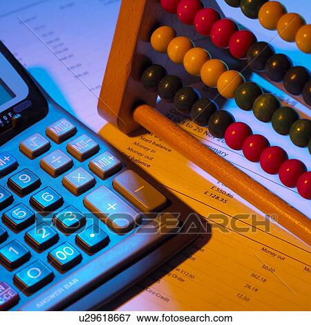 Stock Photo - Abacus and calculator. Fotosearch