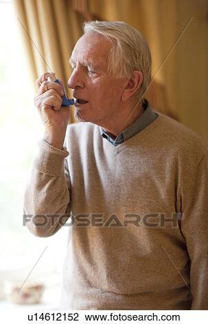 Asthma inhaler use View Large Photo Image Stock Image - Asthma inhaler use. Fotosearch