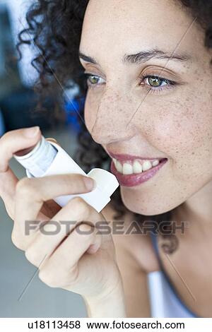 Stock Photo - Asthma inhaler use. Fotosearch