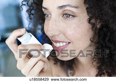 Stock Photo - Asthma inhaler use. Fotosearch