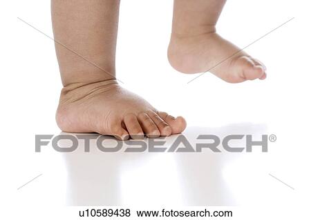 Baby boy's feet View Large Photo Image Stock Photo - Baby boy's feet. Fotosearch