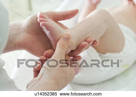 Stock Photography - Baby's foot. Fotosearch