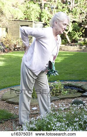 Stock Image - Back pain. Fotosearch