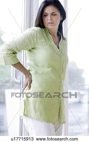 Stock Image - Back pain. Fotosearch