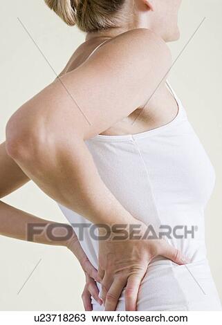 Stock Image - Back pain. Fotosearch