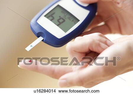Blood glucose test View Large Photo Image Picture - Blood glucose test. Fotosearch