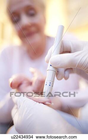 Picture - Blood glucose test. Fotosearch