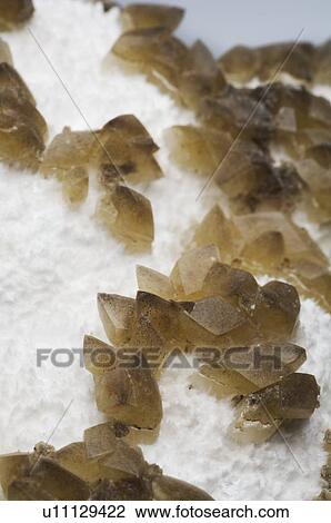 Stock Image - Calcite crystals on modenite. Fotosearch