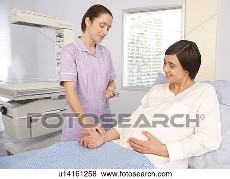 Checking pulse View Large Photo Image Stock Photo - Checking pulse. Fotosearch