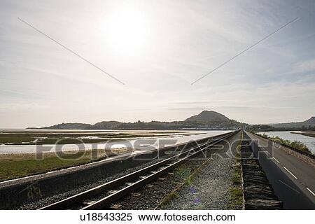 Coastal view of Ffestiniog railway tracks, Porthmadog, Wales, UK View Large Photo Image Stock Photography - Coastal view of Ffestiniog railway tracks, Porthmadog, Wales, UK. Fotosearch