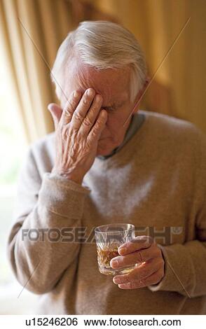 Stock Photograph - Depressed senior man. Fotosearch