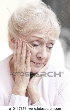 Stock Photograph - Depressed senior woman. Fotosearch
