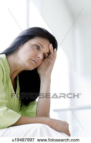 Stock Photo - Depressed woman. Fotosearch
