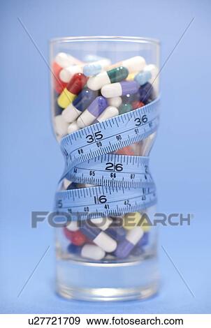 Dieting pills View Large Photo Image Stock Photo - Dieting pills. Fotosearch