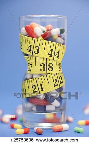 Dieting pills View Large Photo Image Stock Photograph - Dieting pills. Fotosearch
