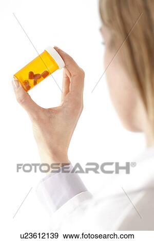 Doctor with pills View Large Photo Image Stock Photo - Doctor with pills. Fotosearch