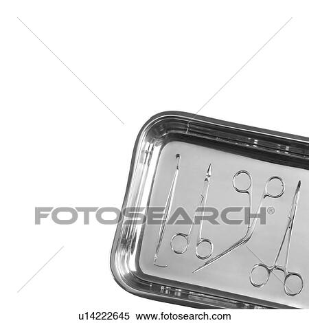 Stock Photography - Forceps in a tray. Fotosearch