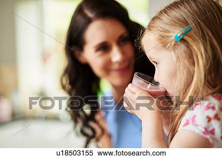 Stock Photography - Girl drinking smoothie. Fotosearch