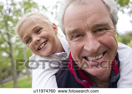 Grandfather and granddaughter View Large Photo Image Stock Image - Grandfather and granddaughter. Fotosearch