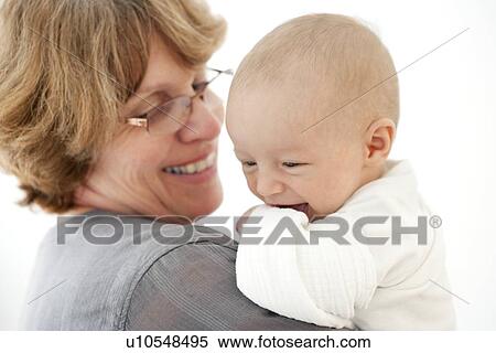 Stock Photography - Grandmother and baby grandson. Fotosearch