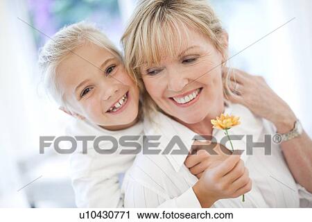 Stock Image - Grandmother and granddaughter. Fotosearch