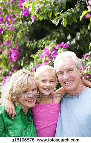 Stock Photo - Grandparents and granddaughter. Fotosearch