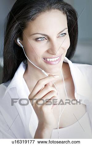 Hands free earphones View Large Photo Image Stock Photo - Hands free earphones. Fotosearch