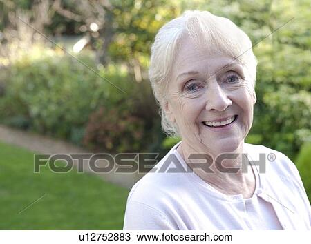 Stock Image - Happy senior woman. Fotosearch