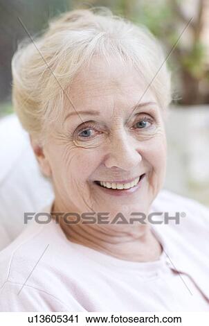 Stock Image - Happy senior woman. Fotosearch