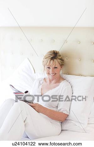 Stock Image - Happy senior woman. Fotosearch