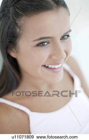 Stock Photo - Happy teenage girl. Fotosearch