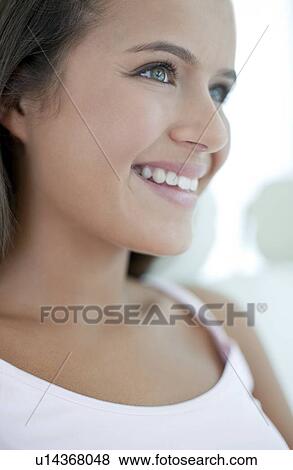 Stock Photo - Happy teenage girl. Fotosearch