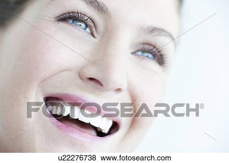 Stock Photo - Happy woman. Fotosearch