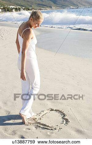 Heart in the sand View Large Photo Image Stock Photo - Heart in the sand. Fotosearch