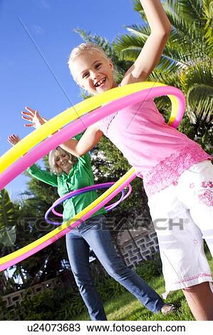 Hula-hooping View Large Photo Image Stock Image - Hula-hooping. Fotosearch