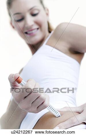 Stock Photo - Insulin injection. Fotosearch