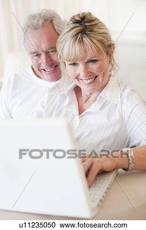 Laptop use View Large Photo Image Stock Image - Laptop use. Fotosearch