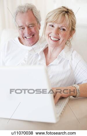 Laptop use View Large Photo Image Stock Photo - Laptop use. Fotosearch