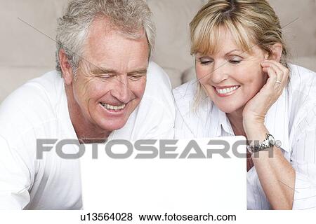 Stock Photo - Laptop use. Fotosearch
