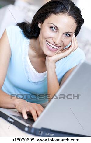 Stock Photography - Laptop use. Fotosearch