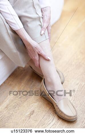 Stock Photograph - Leg pain. Fotosearch