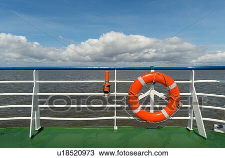 Stock Image - Lifebuoy and radio beacon on ferry, Waddenzee, Friesland, Netherlands. Fotosearch